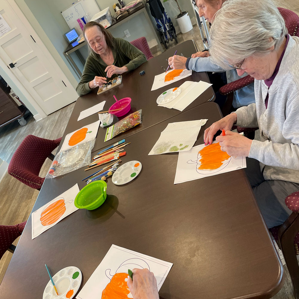 RSL Memory Care of New Berlin, WI doing autumn crafts